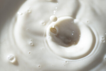 Close up shot of cow milk splash as background