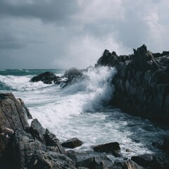 Wild ocean waves crashing against black rocks