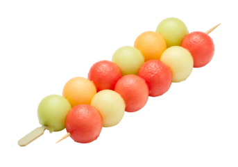 Colorful Fruit-Shaped Popsicles on Wooden Skewers Against a Black Background