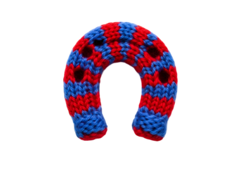 Colorful knitted neck pillow with red and blue patterns on a black background