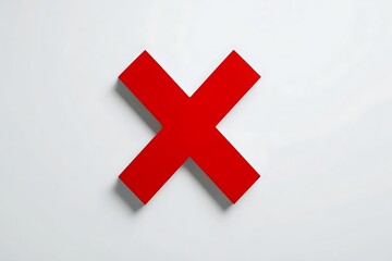 Obraz premium Striking red X symbol displayed on clean white background 