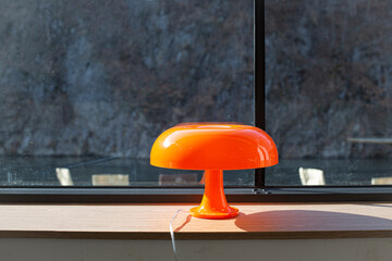 Mushroom shaped orange color stand lamp