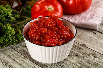 Diced ripe tomato with sauce