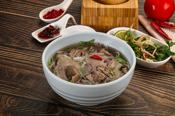 Vietnamese Pho Bo soup with beef and noodles