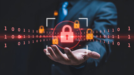 Man in suit holding digital padlock with binary code for cyber security concept and data protection in dark