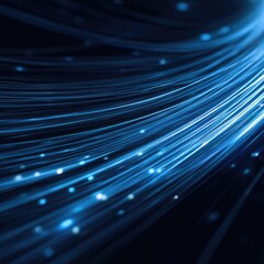 Abstract blue light streaks and glowing particles on a dark background