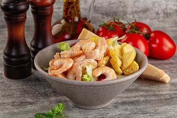 Tasty caesar salad with prawn