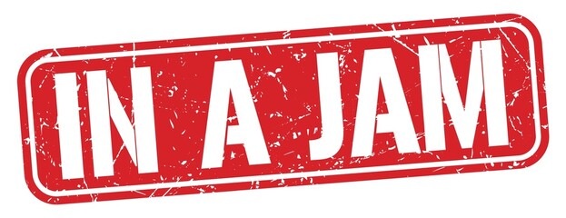IN A JAM text written on red stamp sign.
