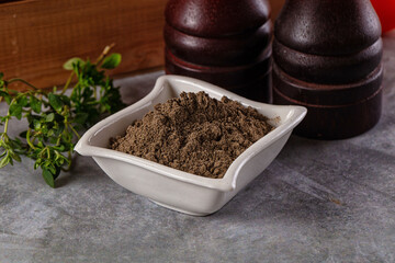 Ground dry black pepper powder