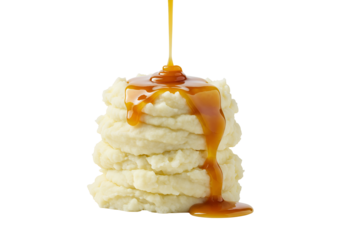Delicious vanilla ice cream stacked with caramel sauce drizzle on a black background