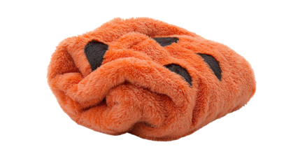 A soft orange towel with a pumpkin face design, ideal for Halloween-themed decor or cozy home use.