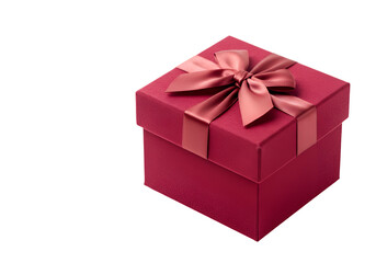 Obraz premium Elegant pink gift box with a satin ribbon and bow on a black background perfect for celebrations