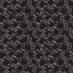 Obraz premium Seamless black and white abstract botanical pattern of intertwined white line art leaves. Dense, intricate design on a solid black background. Ideal for modern, artistic, or gothic themes.