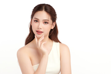 A beautiful young Asian woman with clean, fresh skin against a white background. Skincare, facial...