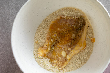 Pork slice coated in breadcrumbs, top view