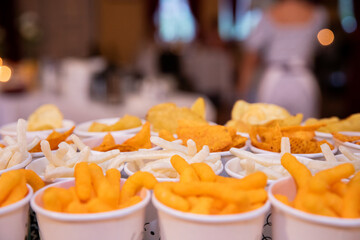 Delicious salty snacks at a party
