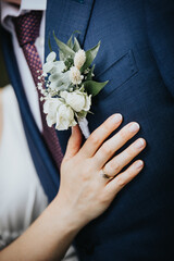 Wedding bride and groom flower and ring
