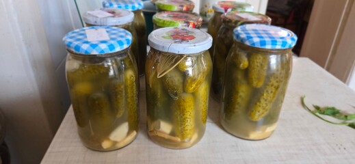 pickled cucumbers in a glass jar