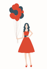 ドレスを着て風船を持っている女性