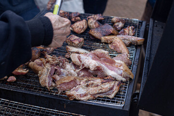 Grilled quail on the grill grate at walk street food.