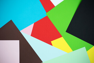 Colorful assortment of paper sheets arranged in artistic display