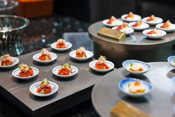 Buffet table with traditional Japanese appetizer dishes