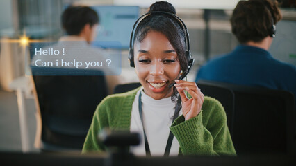 Smiling customer service representative wearing headset is assisting client modern office...
