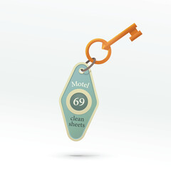 motel key with plastic keychain on white