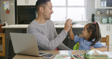 High five, laptop and father with child for homework in kitchen for education, learning or help....