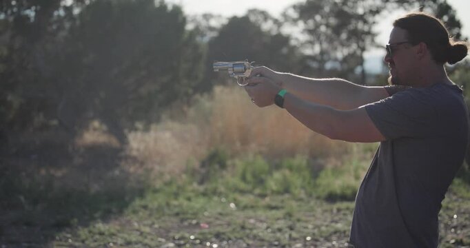 Man Shooting Dual Action 357 Revolver
