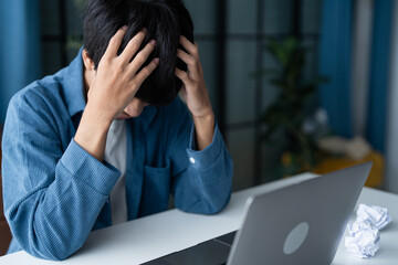 Stressed Man Struggling to Generate Ideas in Office