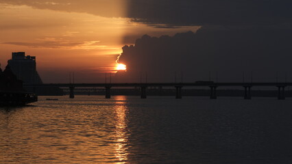 bridge against the backdrop of a sunset