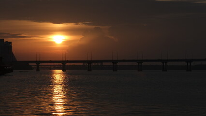 bridge against the backdrop of a sunset