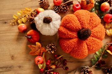 autumn, fall, decoration, decor, pumpkin, pumpkins, artificial pumpkin, knitted pumpkin, pinecone, pinecones, dried leaves, leaf, foliage, orange, brown, red, yellow, berries, rowan, table, wooden