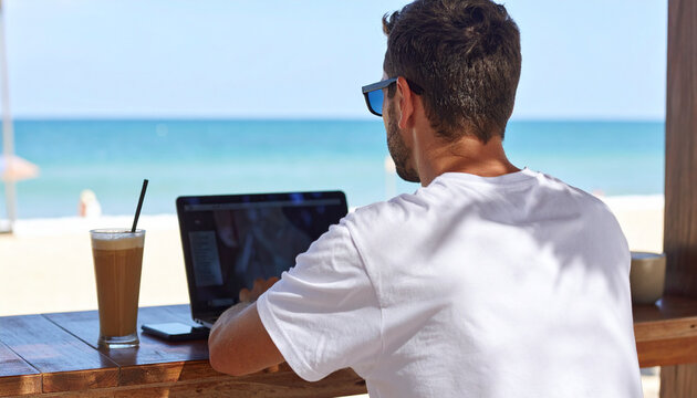 Digital Nomad Working Remotely at Tropical Beach Cafe