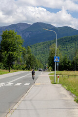 Cyclist on a Mountain Road