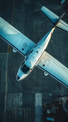 High-angle view of a light aircraft on a tarmac