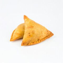 Two golden samosas, Indian snacks