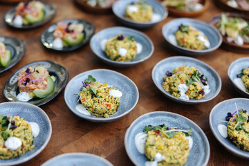 Gourmet Appetizers Served in Small Ceramic Bowls