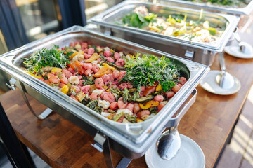Buffet with Hot Trays of Food