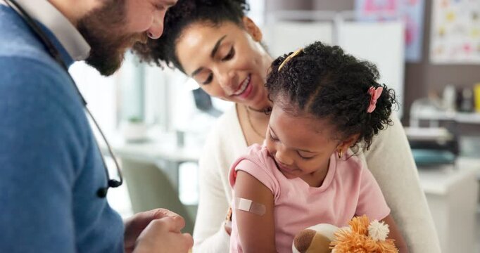 Doctor, mother and plaster on child at hospital for first aid, injection and virus vaccination. Pediatrician, helping and kid with bandage for medical checkup, immunization shot and wound protection