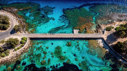 Aerial view of a vibrant coastal bridge over turquoise water