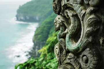 Intricate stone carving of mythical creature overlooks a dramatic coastal cliffside scene.
