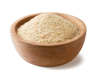 Breadcrumbs in a wooden plate on a white background. Isolated