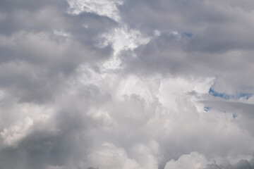 White clouds background. View of the sky with large rain cloud texture