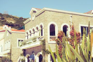 south european, mediterranean stone house view, summer rental property concept
