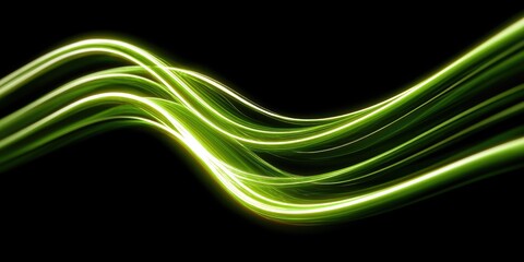 Abstract flowing green light trails on black background
