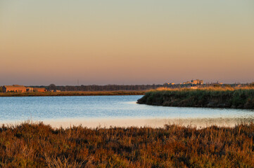 sunset over the lagoon, Po river delta, Comacchio, Ferrara, Italy