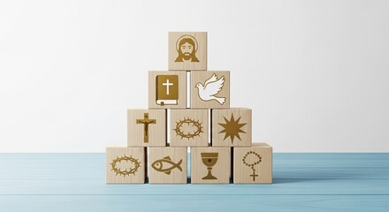 Wooden blocks with religious symbols shaped into a pyramid. Christian icons depiction on a light background. Idea for spiritual education and faith presentation.