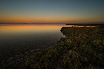 sunset over the lagoon, Po river delta, Comacchio, Ferrara, Italy
